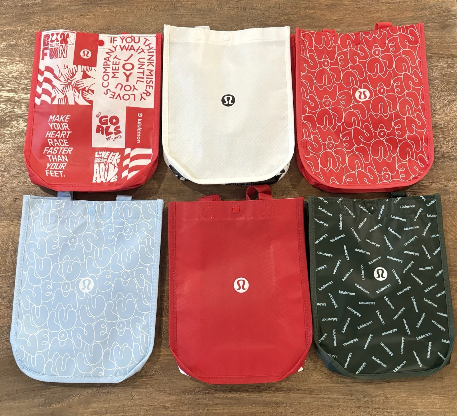 6 – Lululemon – New, Small Shopping Bags, (4 patterned, 2 solid) Free Ship
