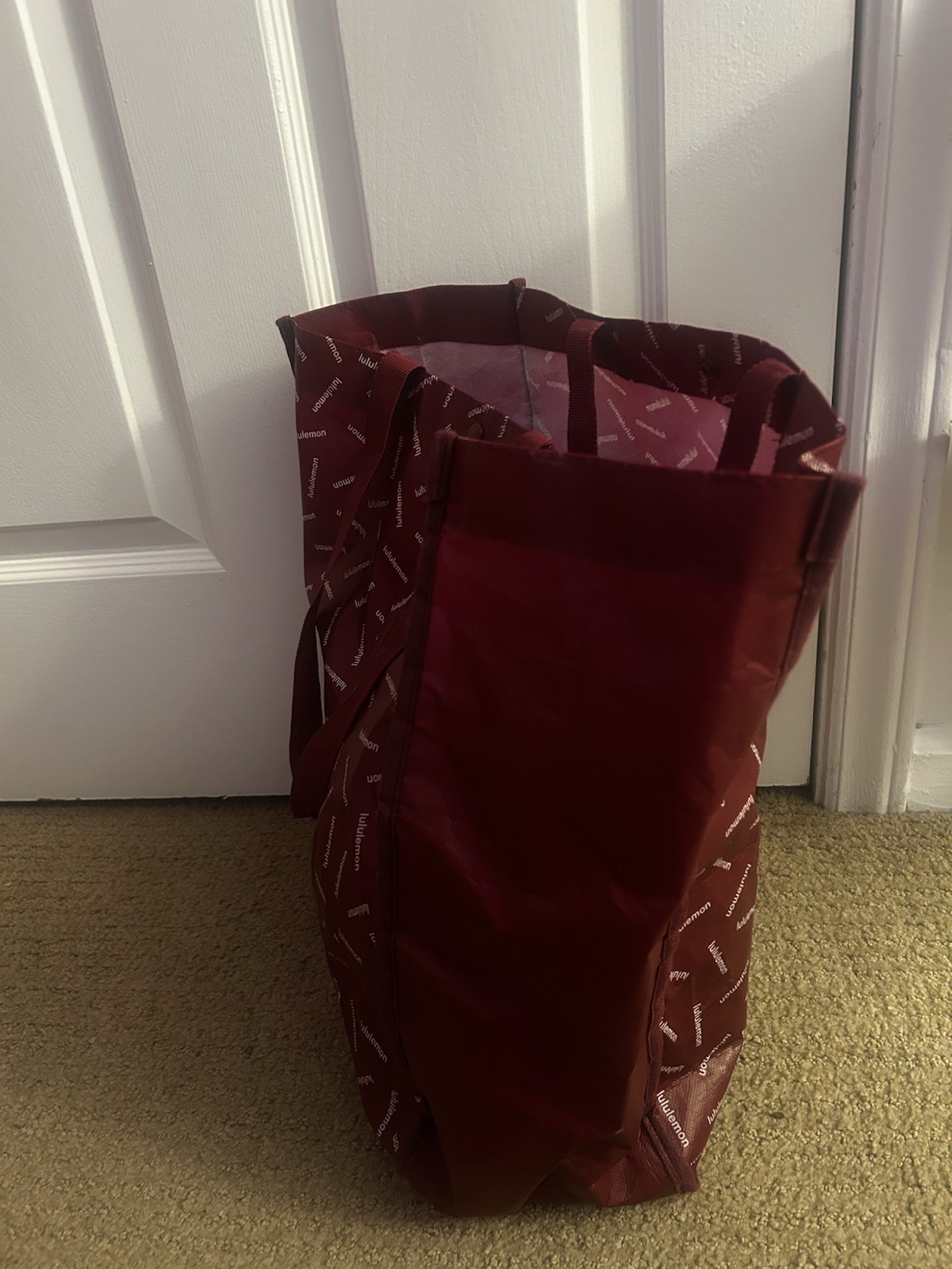Lululemon Red Foldable Plastic Reusable Shopping Bag Modern All-Over Pattern