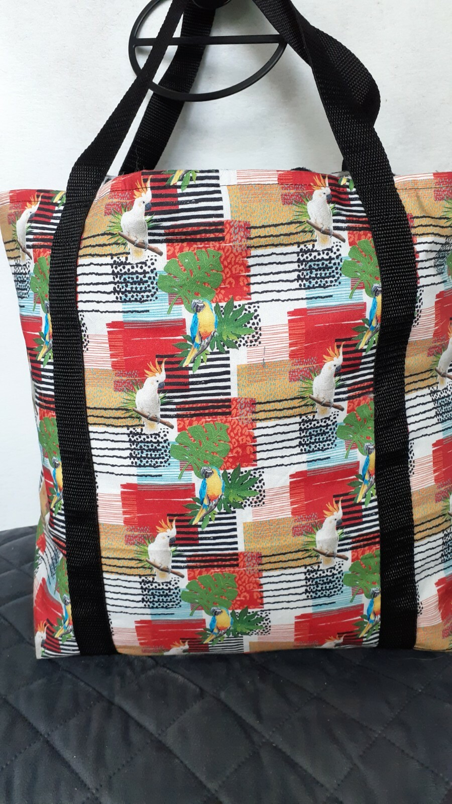 Handcrafted all purpose bag-multi colored parrot & cockatiel printed fabric