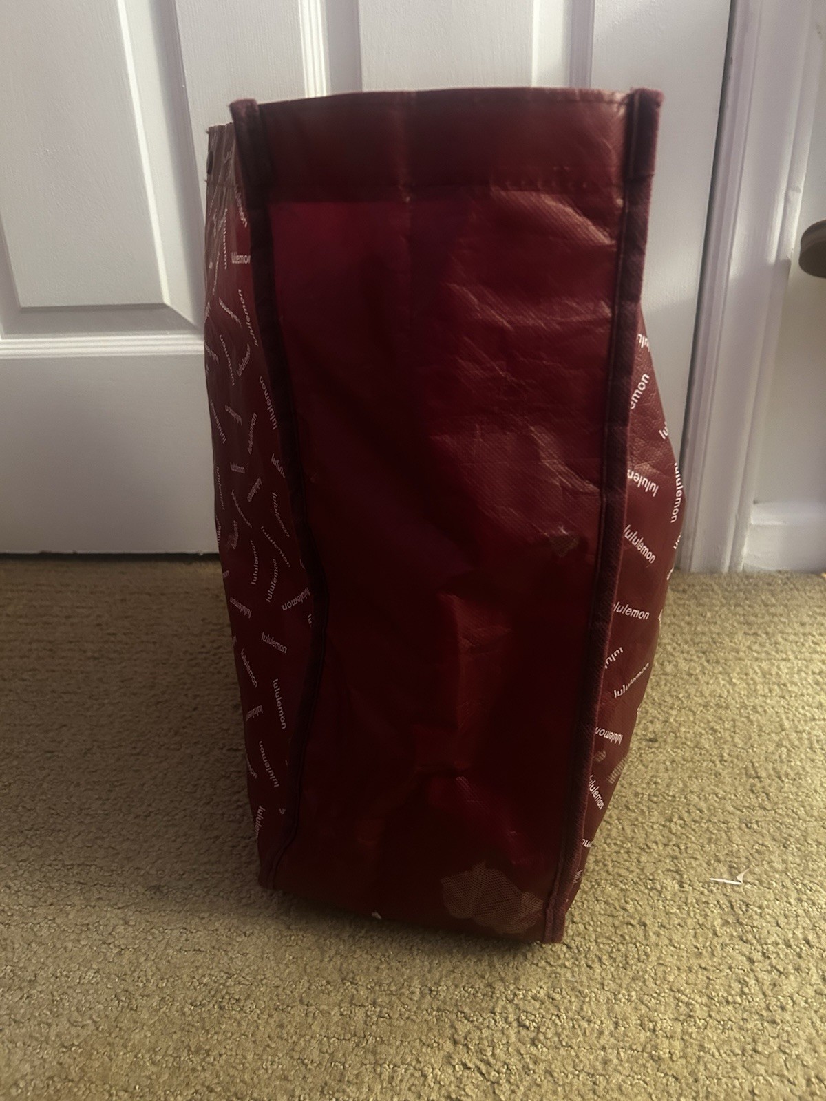 Lululemon Red Foldable Plastic Reusable Shopping Bag Modern All-Over Pattern