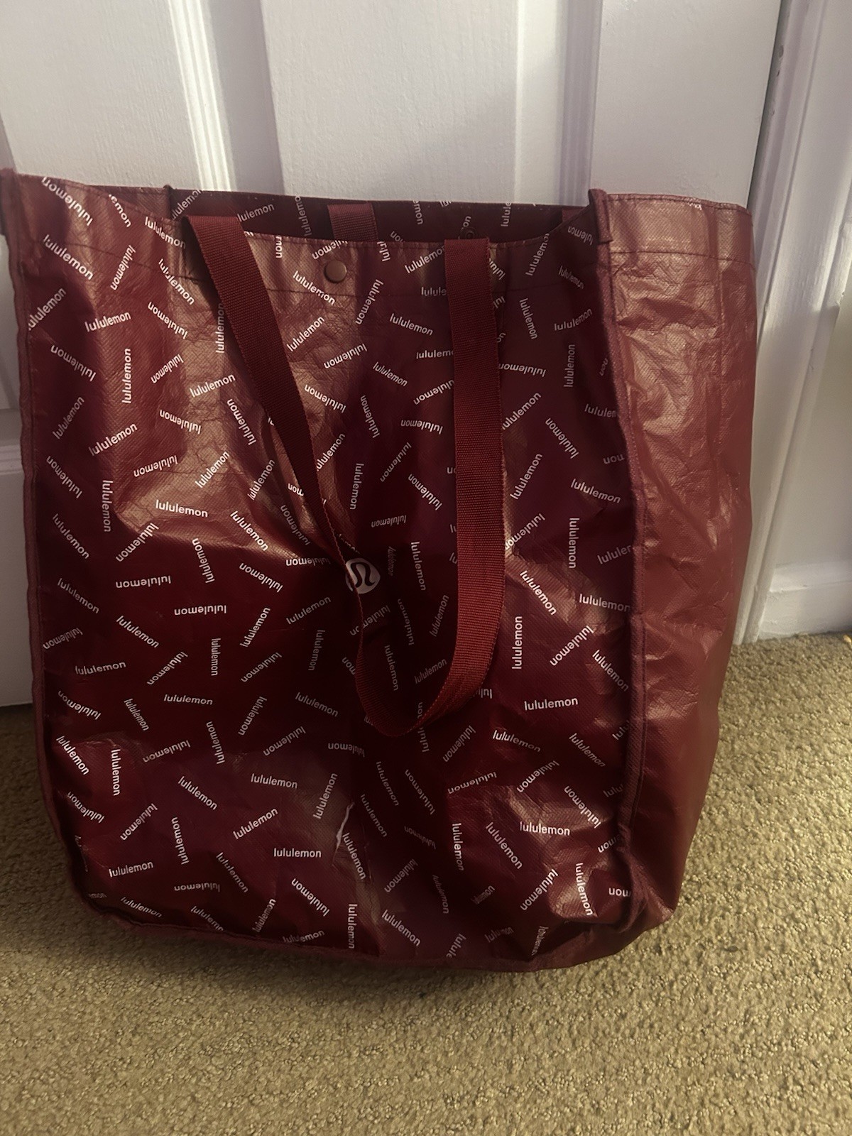Lululemon Red Foldable Plastic Reusable Shopping Bag Modern All-Over Pattern