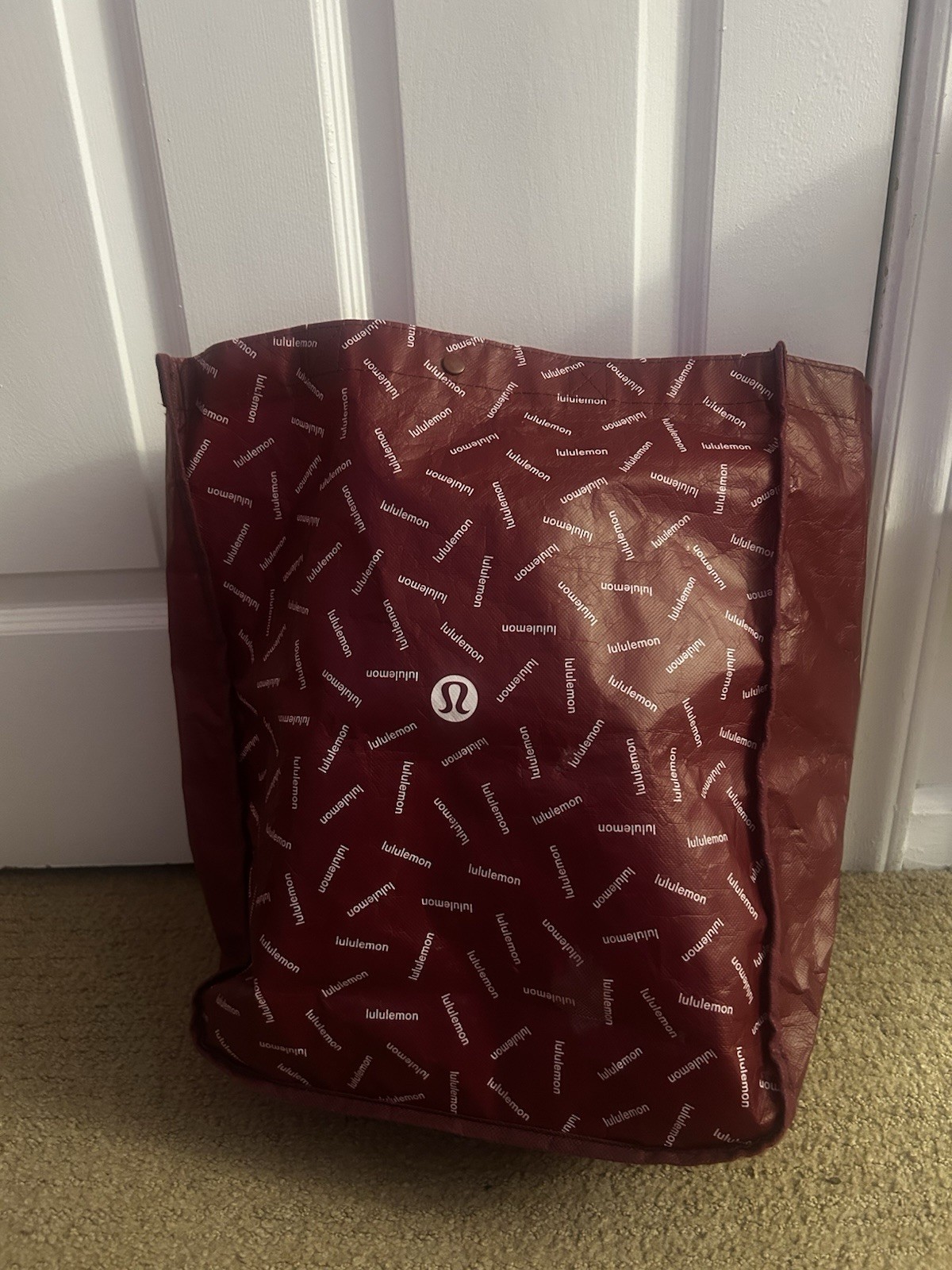 Lululemon Red Foldable Plastic Reusable Shopping Bag Modern All-Over Pattern