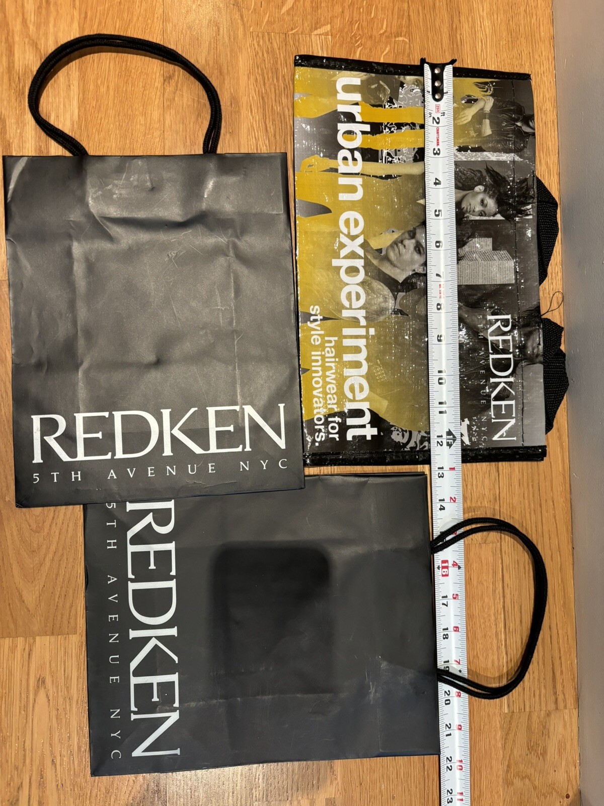 New set of 3 Redken bags. 2-Black shopping bags + 1-Reusable small tote